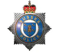 Logo of the Sussex Police.