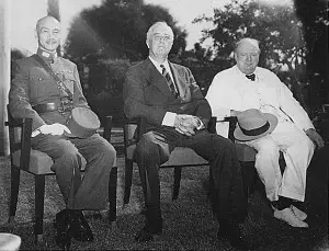 Generalissimo Chiang Kai-shek, Franklin D. Roosevelt, and Winston Churchill at the Cairo Conference, 25 November 1943.